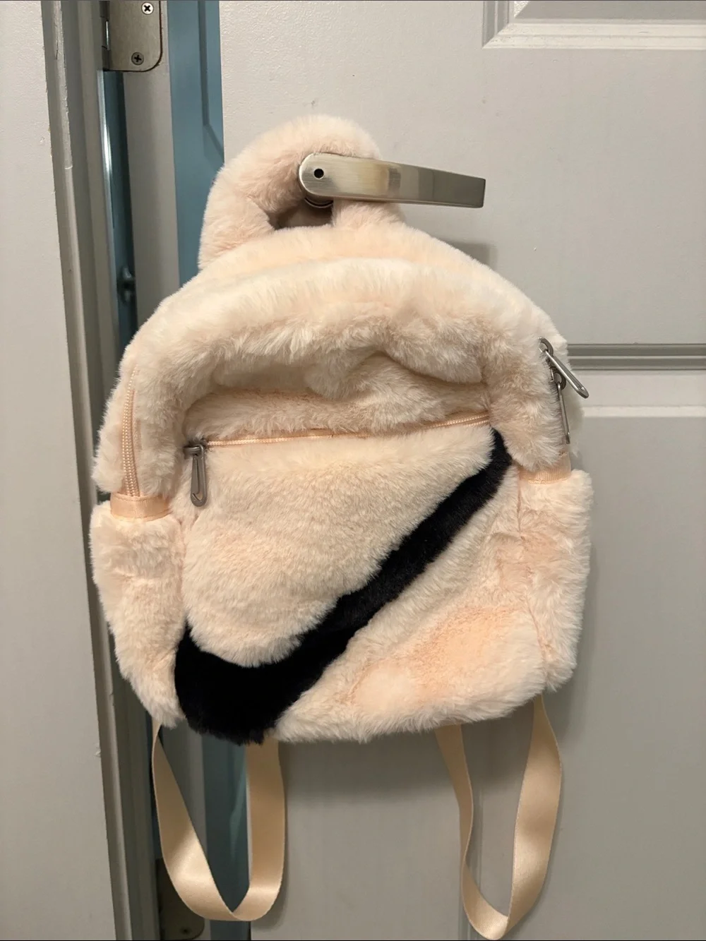 Nike Plush Faux-Fur Mini Backpack in Cream with Black Swoosh